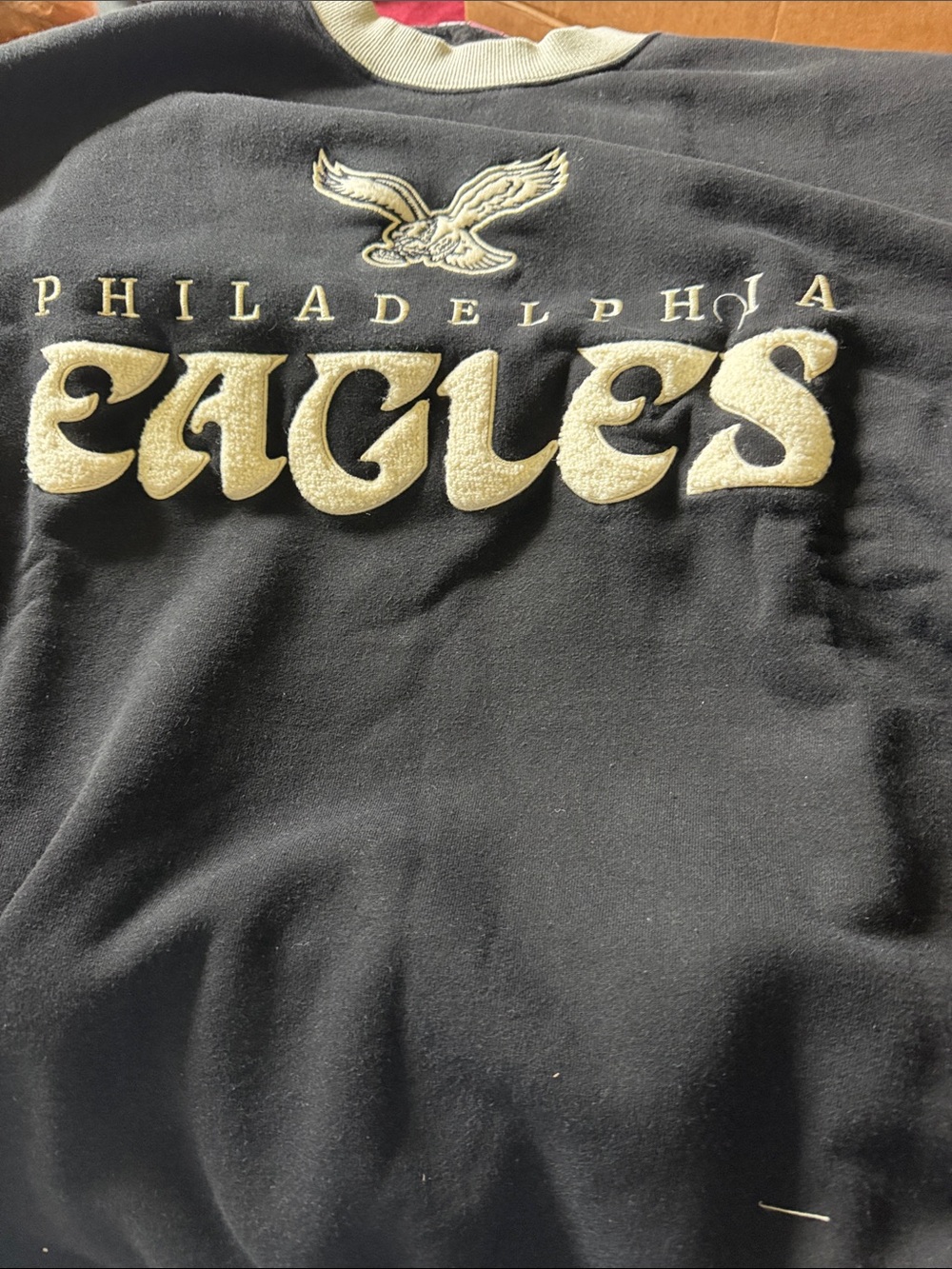 Mitchell & Ness Black Crewneck Sweatshirt with Cream Script Eagles